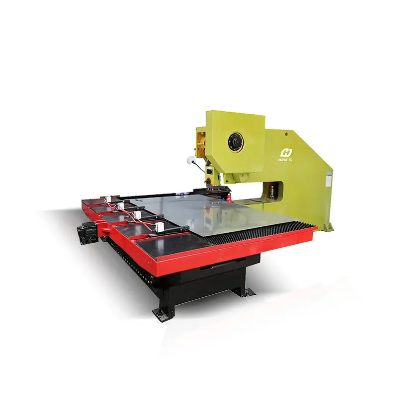 Industrial CNC plasma cutting machine with a lime-green housing and red working table for metal fabrication