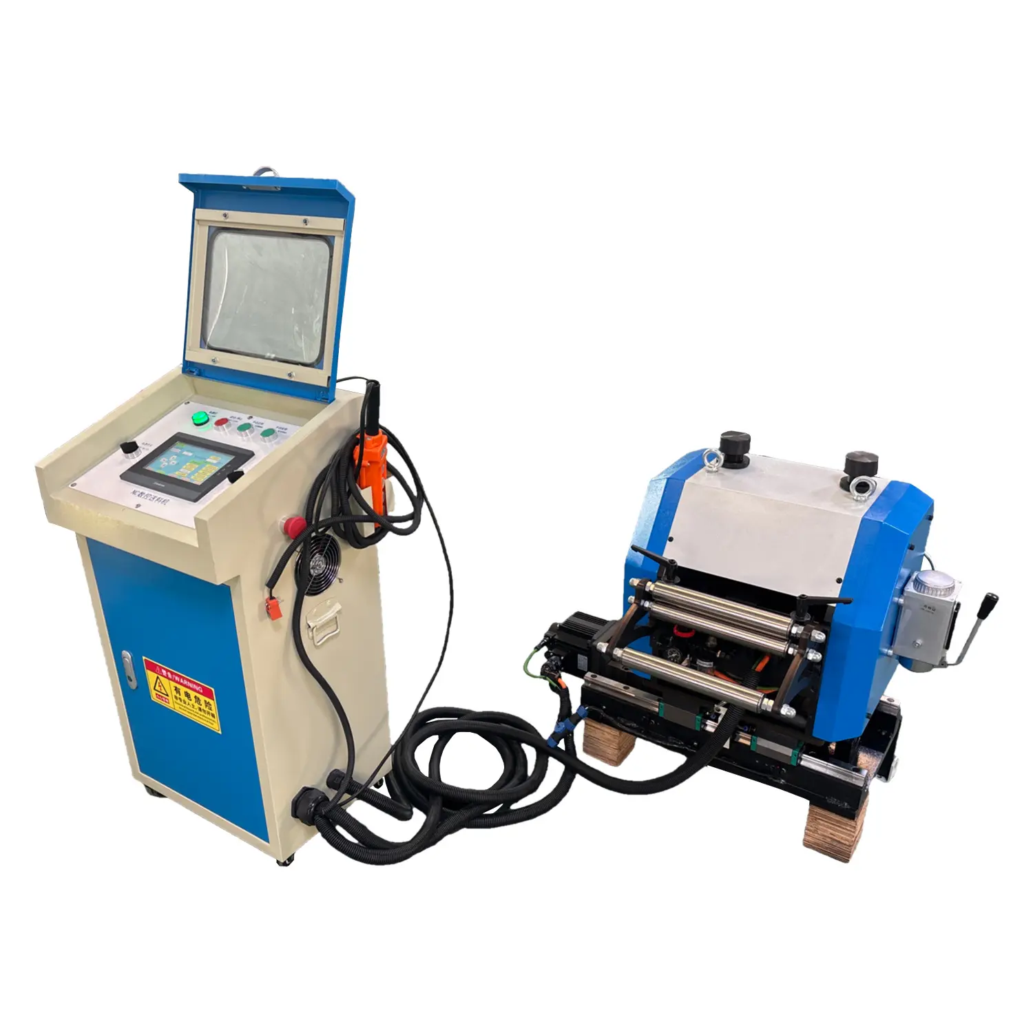Industrial control panel with touchscreen and blue-beige housing connected by cables to a blue roller-laminating machine on the right.